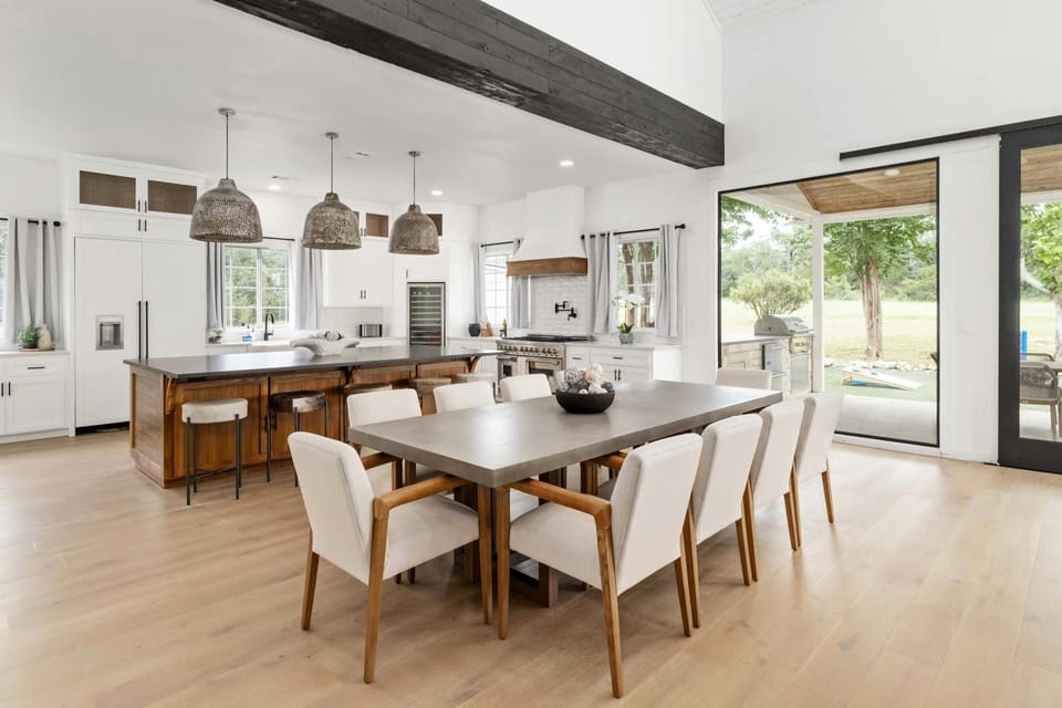 Dining Room table that seats 10 people, plus 4 seats at the bar