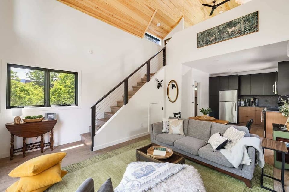 The main floor features an open layout that connects the kitchen, dining, and living areas. Modern, cozy, and designed for connection.