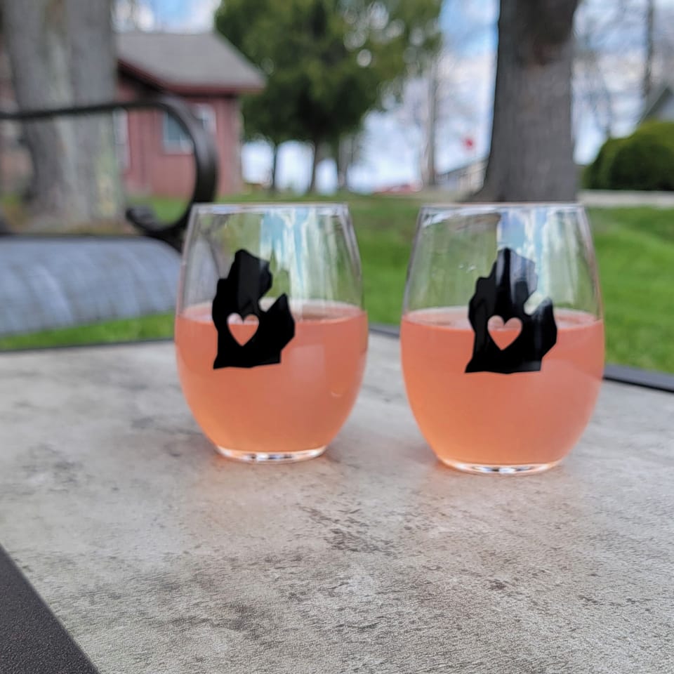 Enjoy a glass of wine on the front patio with lake view.