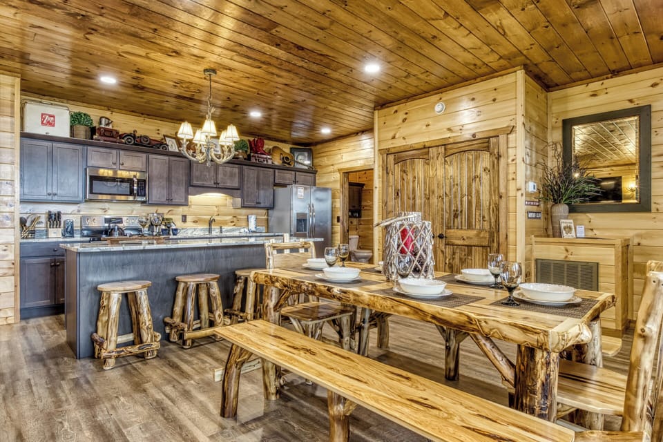 Cabin with a View in Pigeon Forge "Mountown Moments Vista" - Dining table and fully furnished kitchen