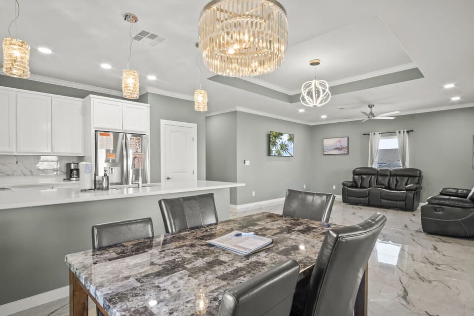 `Dine in Coastal Elegance – Open Concept Kitchen & Dining Area`