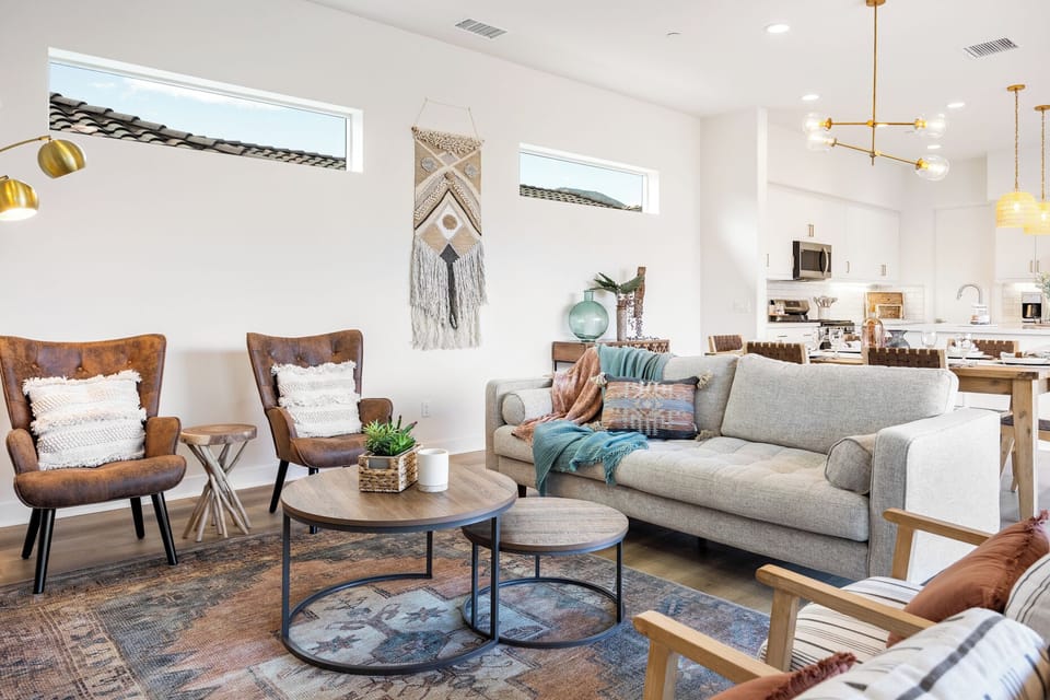 Bright living room with soft, earthy accents.