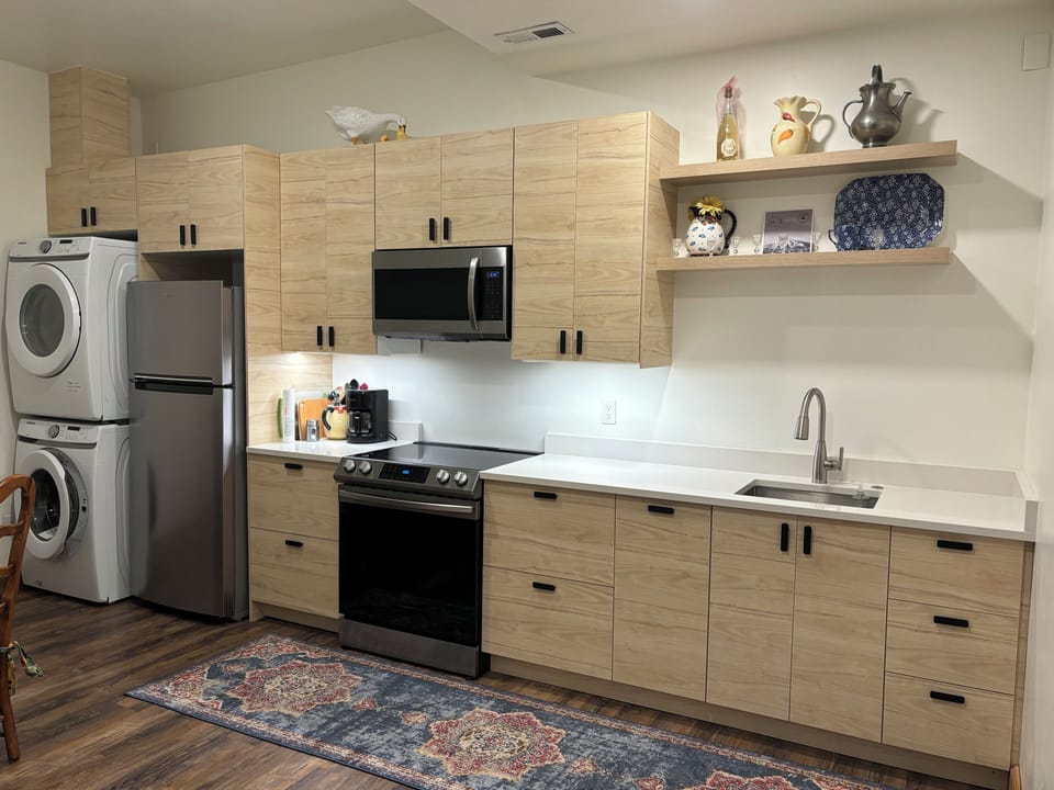 Kitchen with private Fridge and laundry