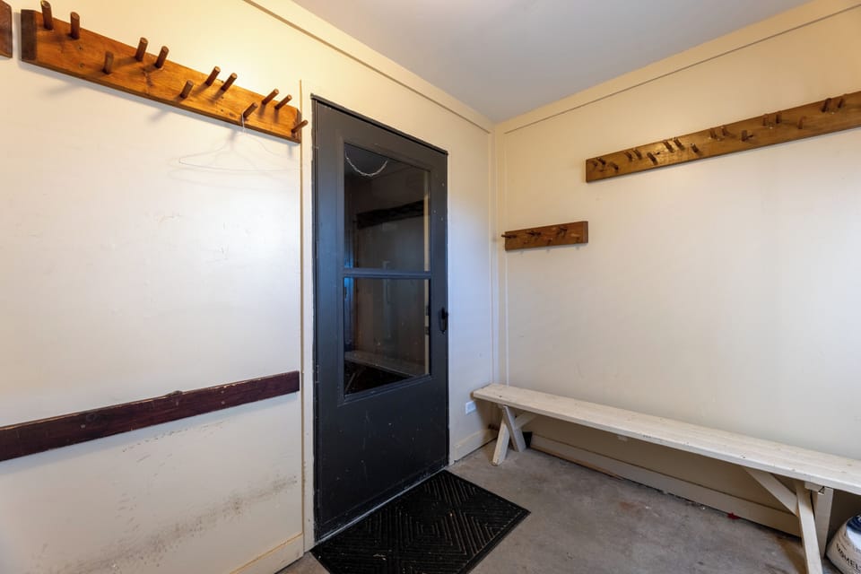 Enclosed Entry with ample ski racks