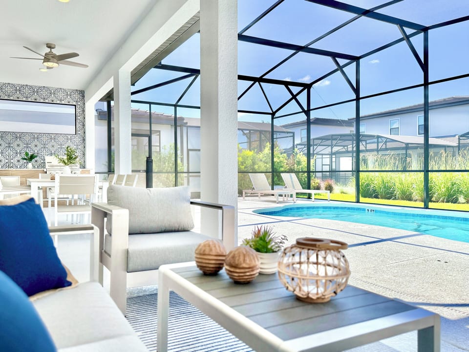 Indoor pool, cozy seating, summer kitchen. Perfect retreat!