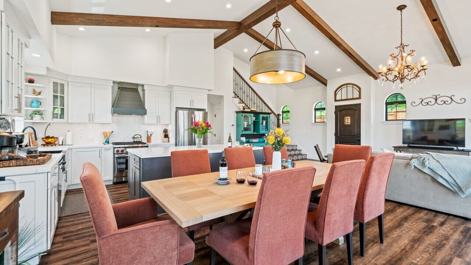 Gather in an elegant yet comfortable dining space adjacent to the kitchen and living room