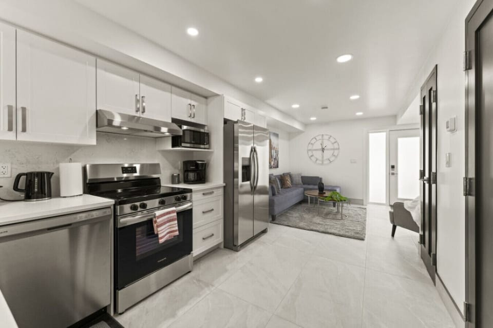 Open layout connects the kitchen to dining and living areas.