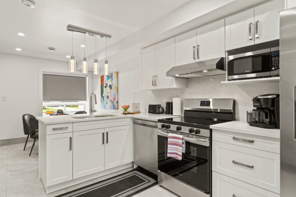 Glossy surfaces reflect light across the room.