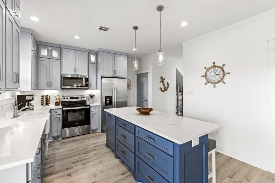 Cook like you’re home—fully stocked Galveston Island kitchen with the signature KitchenAid Stand Mixer and plenty of prep space.