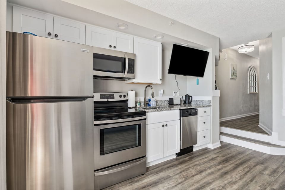 Prepare delicious meal- Equipped Kitchen