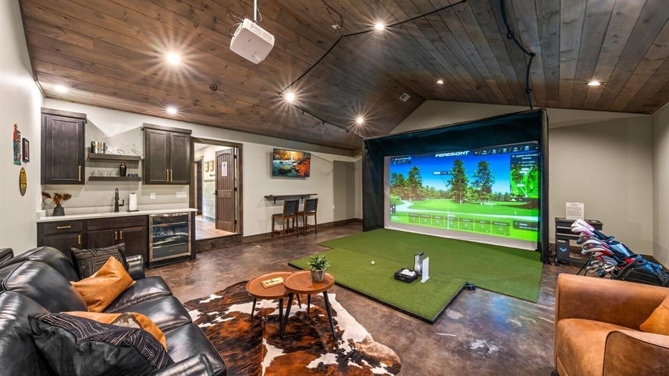 The Golf Simulator Room also has a Smart TV of its own, and a wet bar! The perfect hang spot in the house!