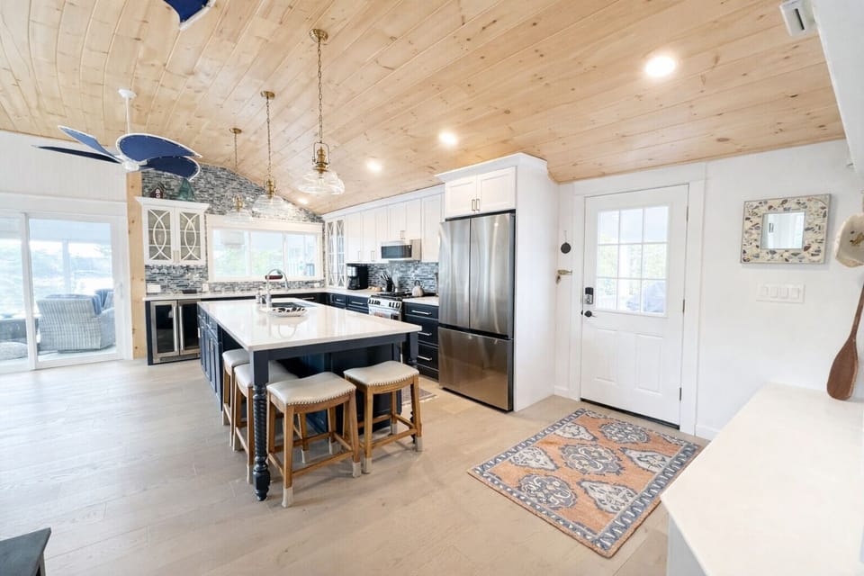 Kitchen area with expansive island.