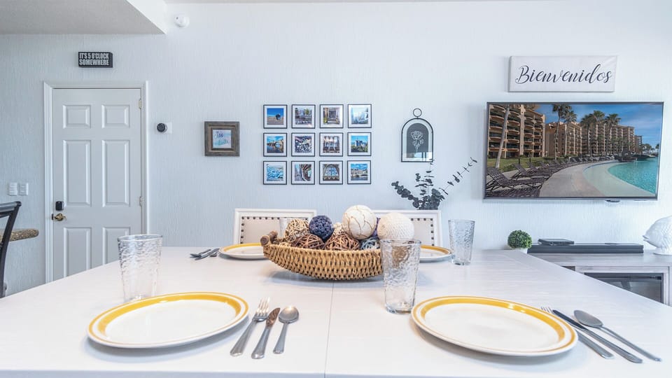 Raised cafe style dining table for four guests.