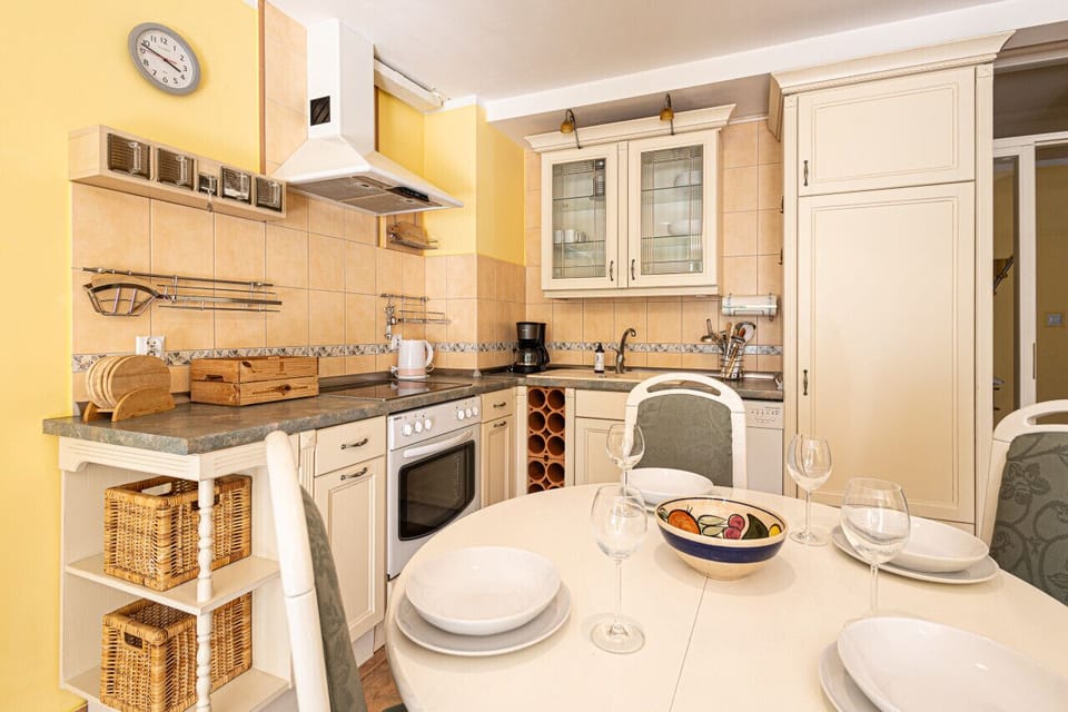 dining room table and kitchen on the upper floor