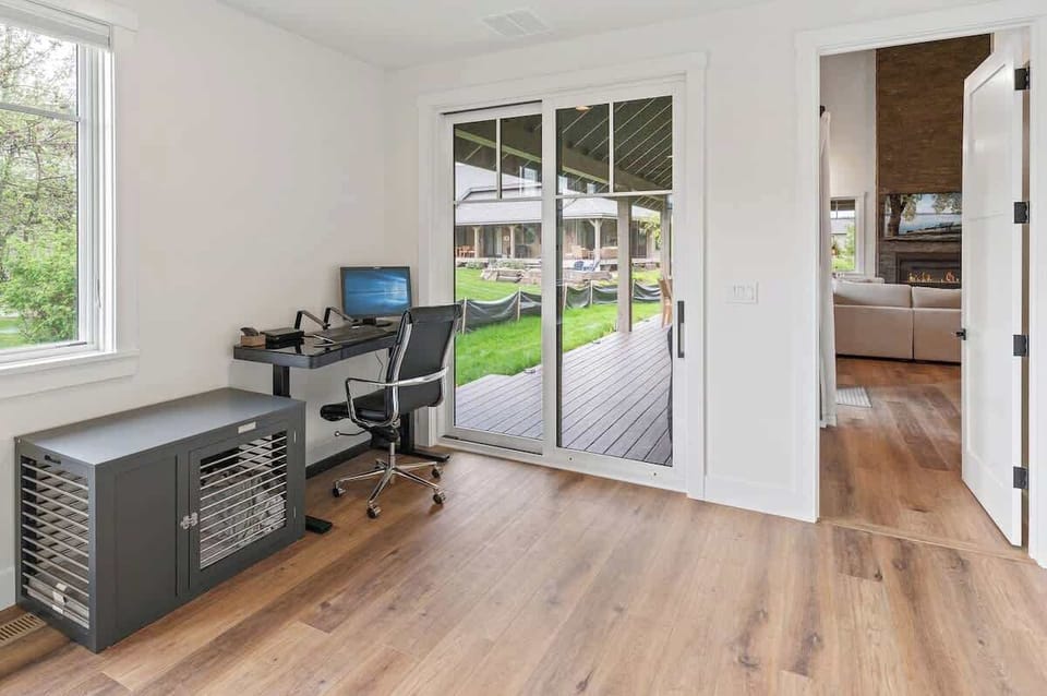 This pet friendly home comes with it's own crate for your smaller dog friends