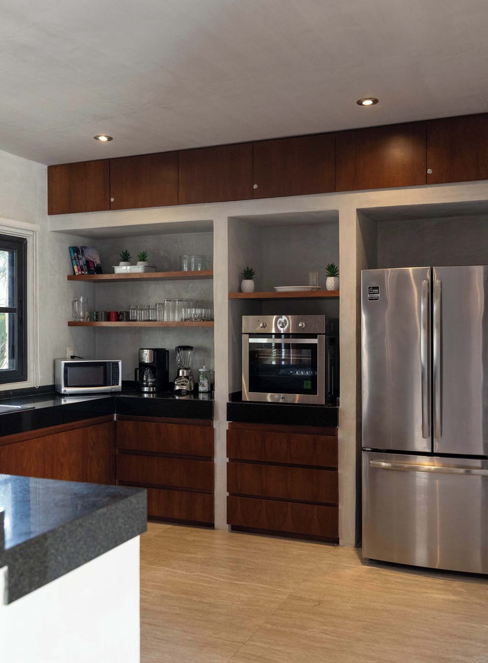 The fully equipped kitchen features high-quality appliances and everything you need to prepare meals