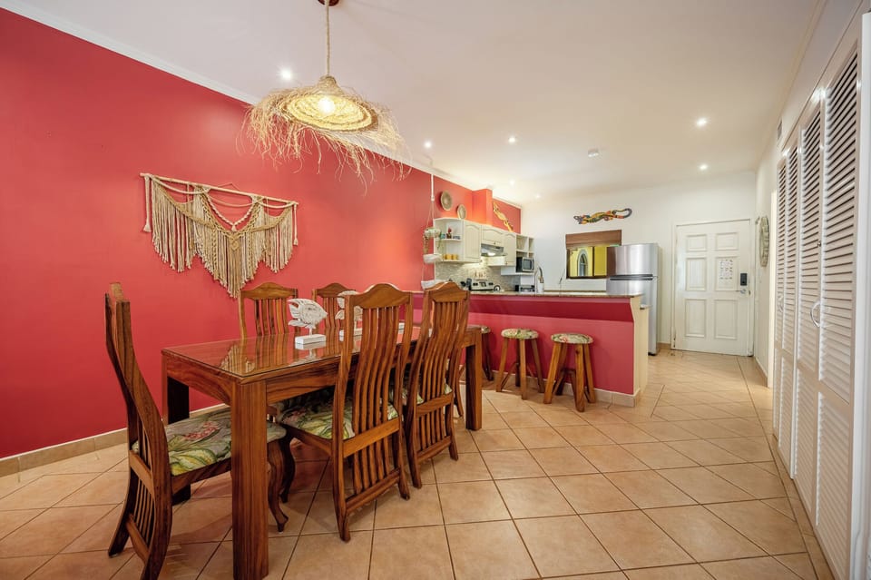 Six person dining table in addition to three stools