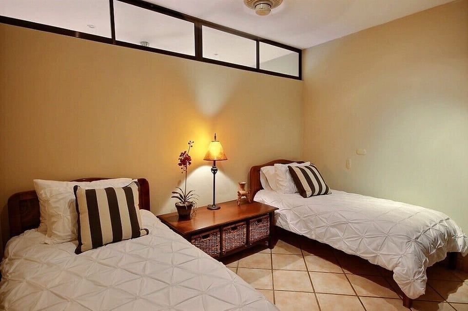 Perfect for singles or kiddos joining your stay, our suite offers double twin beds.