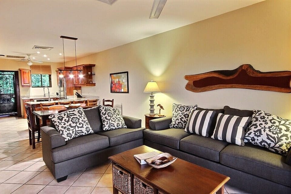 Whenever you're not at the pool or beach, relax on our contemporary furniture in central AC.