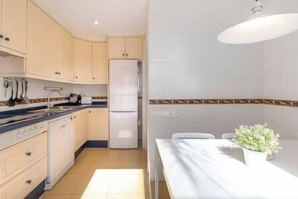 The kitchen is fully equipped with a table and chairs and all the utensils you would need. (1)