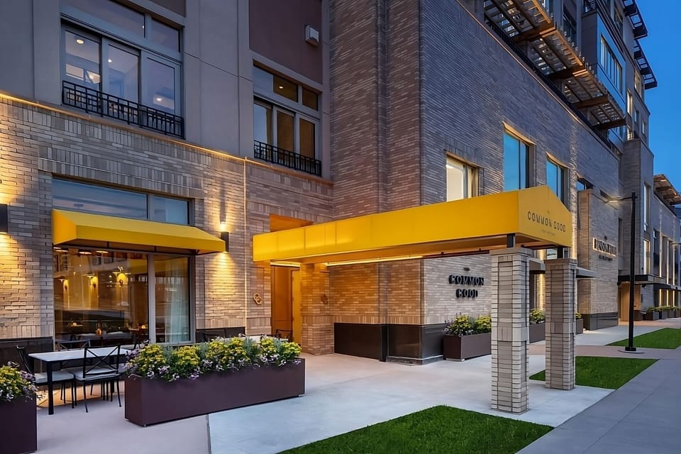 Arrive with ease at a modern hotel entrance at dusk.