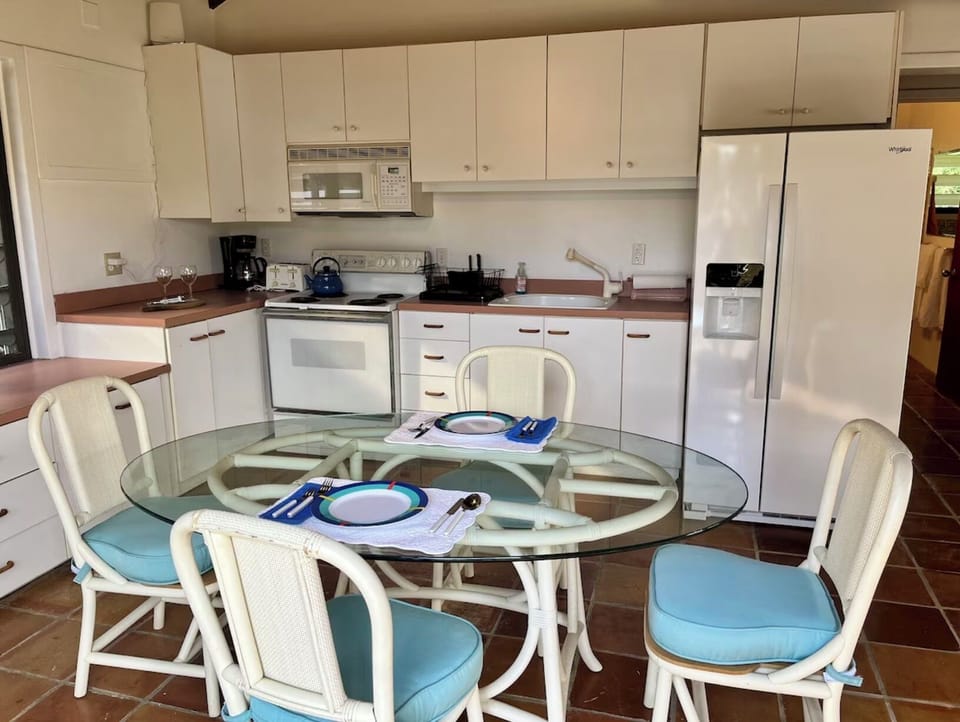 Kitchen, living & entry on upper level with bedroom 2, 3 and shared bathroom