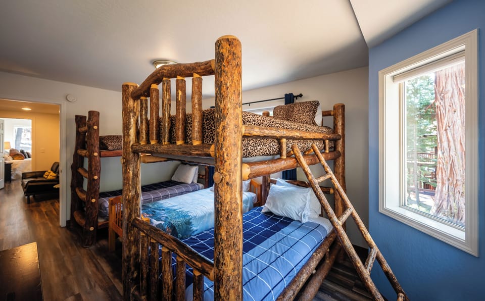 Bedroom #6 with 2 bunk beds and 1 single bed. Sleeps 5 people.