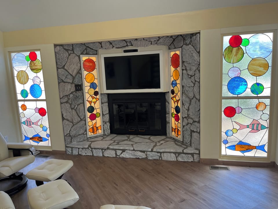 Living area on main floor Stain Glass thru out