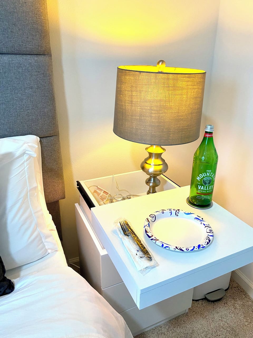 Sliding night stand can be used as dinning table