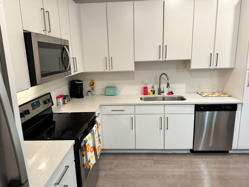 Fully equipped kitchen includes all major appliances. 