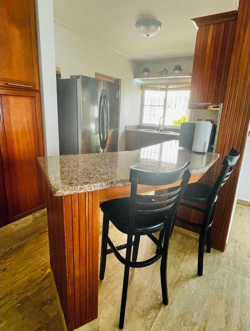 Kitchen with bar for extra seating