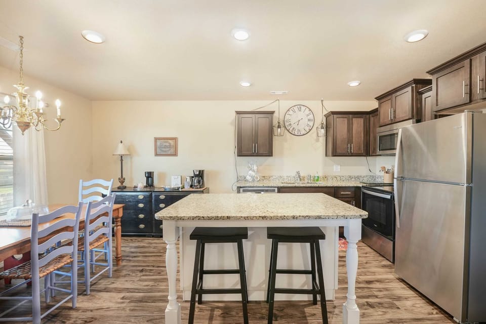 Gather for family dinners or game nights at the spacious dining table.