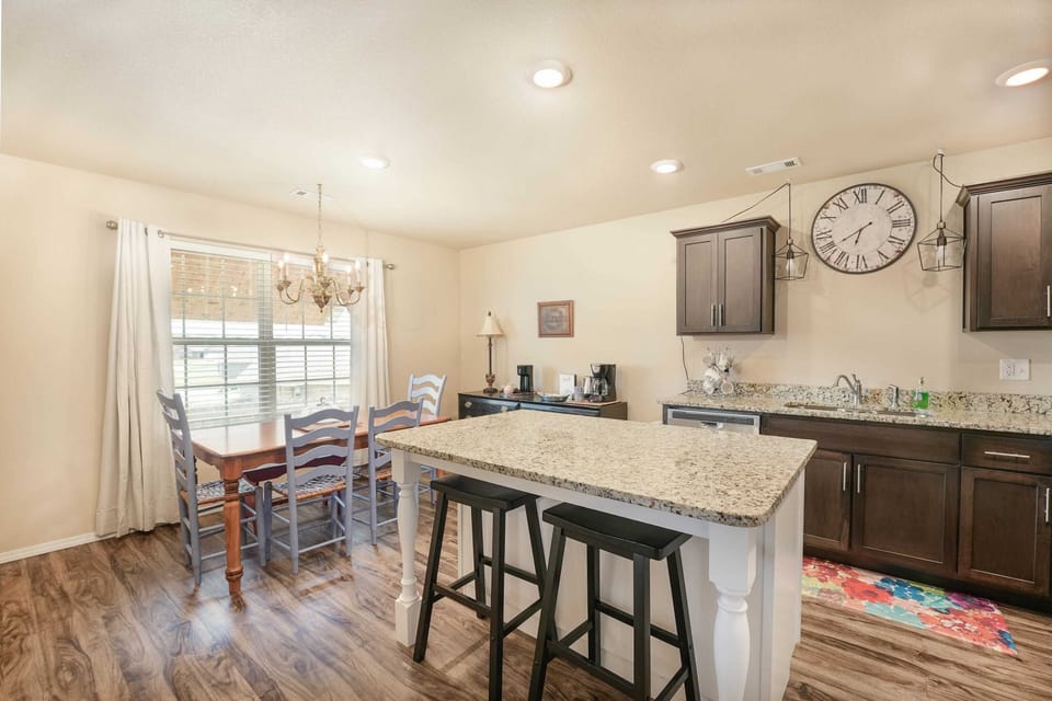 Cook like a pro in our fully stocked kitchen with stainless appliances, cookware, and coffee bar.