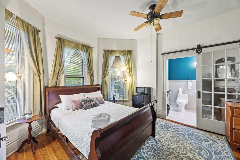 Bedroom 1 - Unit 1: Experience ultimate coziness in our charming bedroom with a queen bed. Your home away from home awaits!