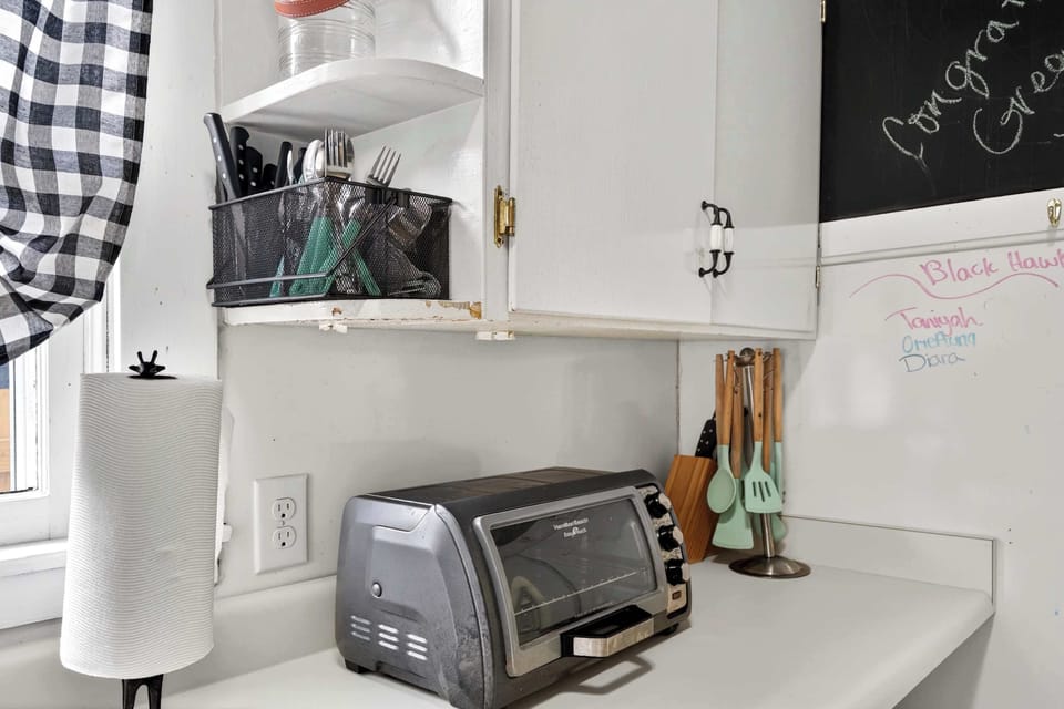 Kitchenette: This convenient kitchenette includes essential small appliances to prepare quick meals, snacks, or your morning coffee with ease.