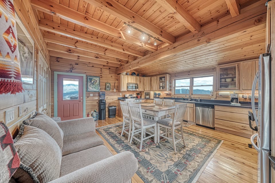 Kitchen with view of front door. You would enter through this door and immediately into the kitchen area.