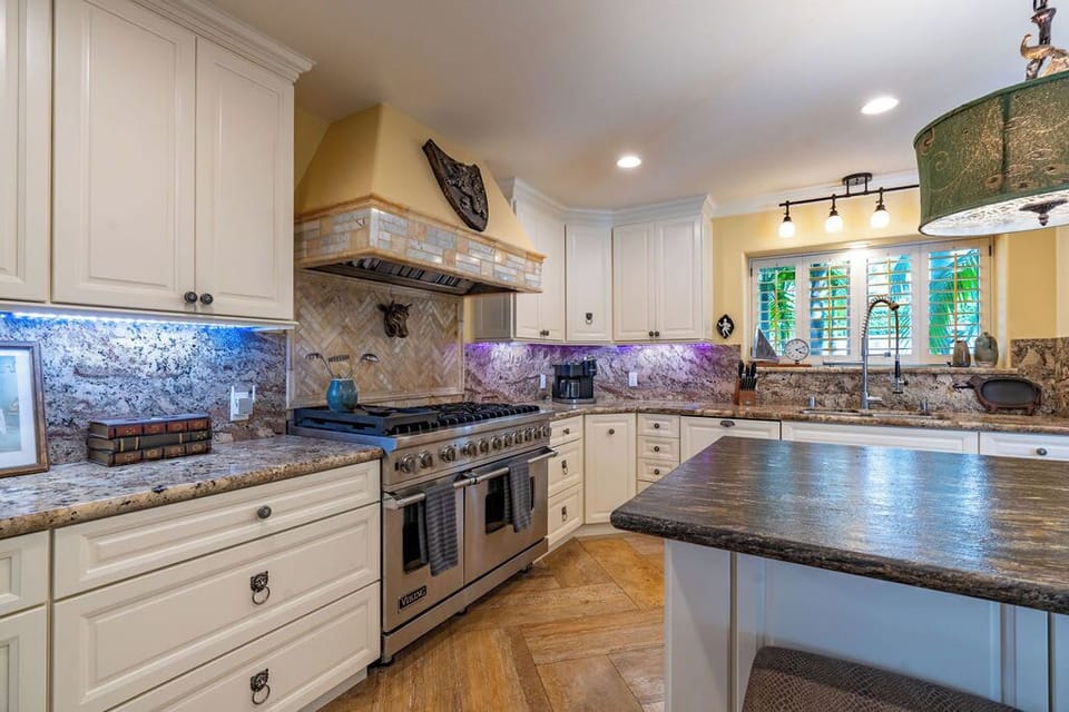Step into our spacious gourmet kitchen adorned with stainless steel appliances, a chef's dream come true!