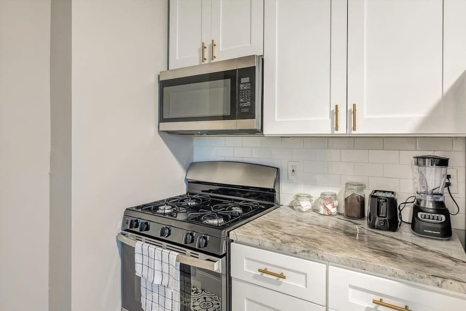 Fully stocked kitchen with counter height seating