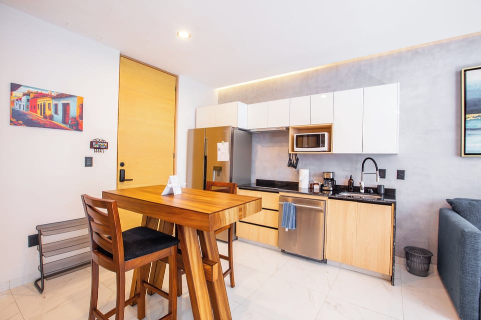 The kitchen is fully-equipped with top-of-the-line appliances