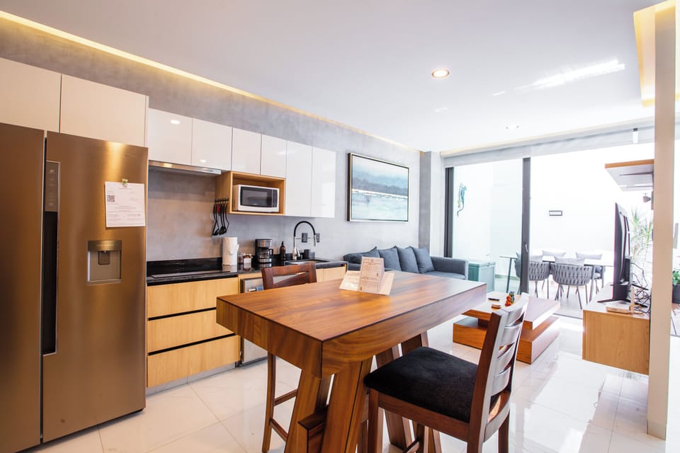 Kitchen amenities include a fridge, stove, microwave and dishwasher