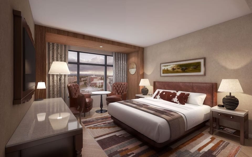 Settle into a serene king room with cozy window nook.