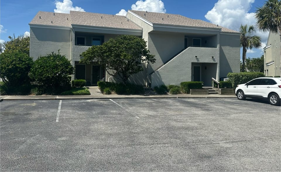Front of condo ( landscape has been removed)
