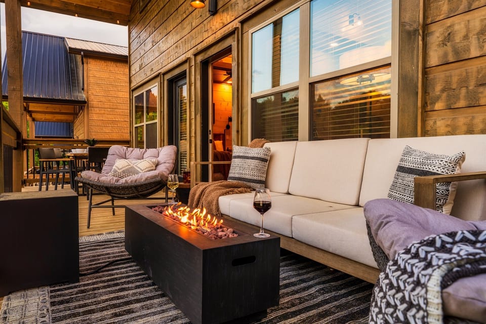 Cozy nights, fireside chats, and unforgettable memories. Your perfect vacation awaits. Deck with propane fireplace on the upper level deck.