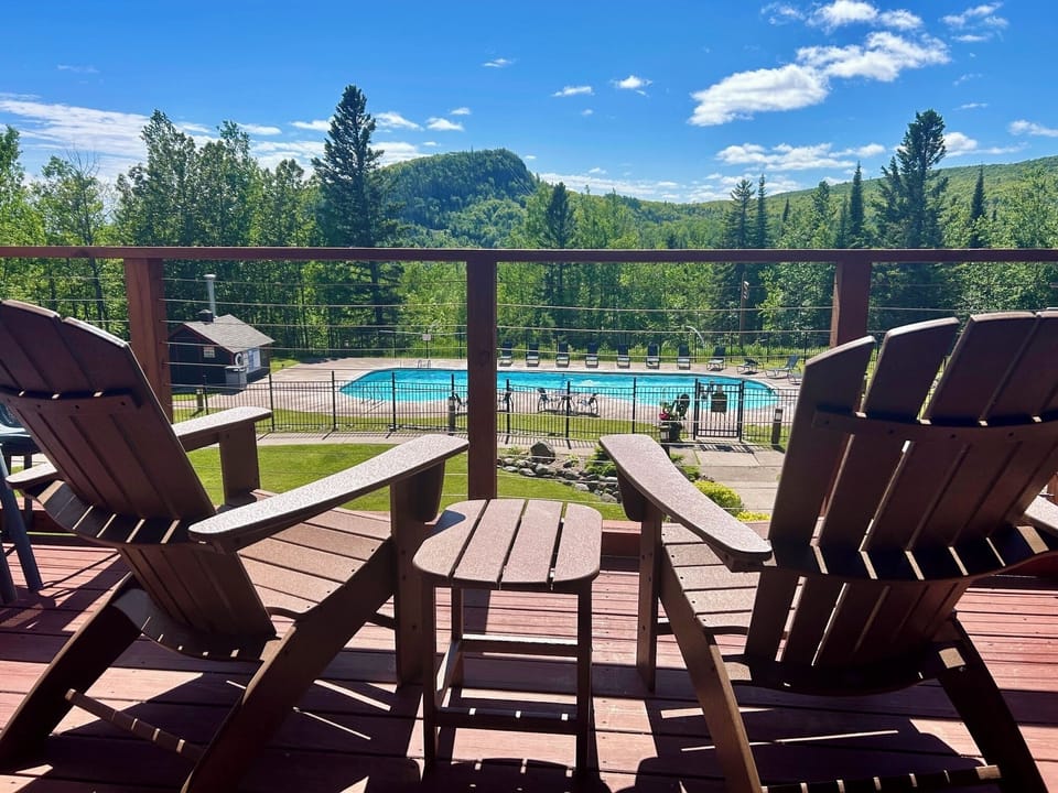 Large size balcony overlooking Moose Mountain & Seasonal Outdoor Pool