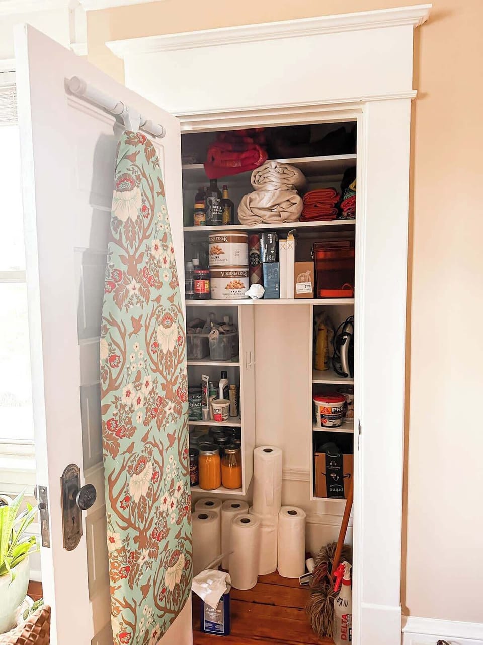 Storage nook with shelving and thoughtful organization