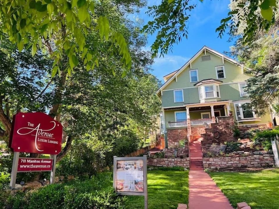 Welcome to The Avenue, where historical elegance meets modern comfort in the heart of Manitou Springs.