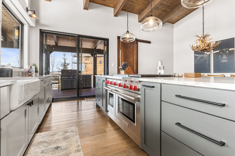 Kitchen with 6 Burner Wolf Gas Stove