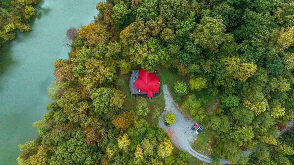 Aerial view of the home and the lake