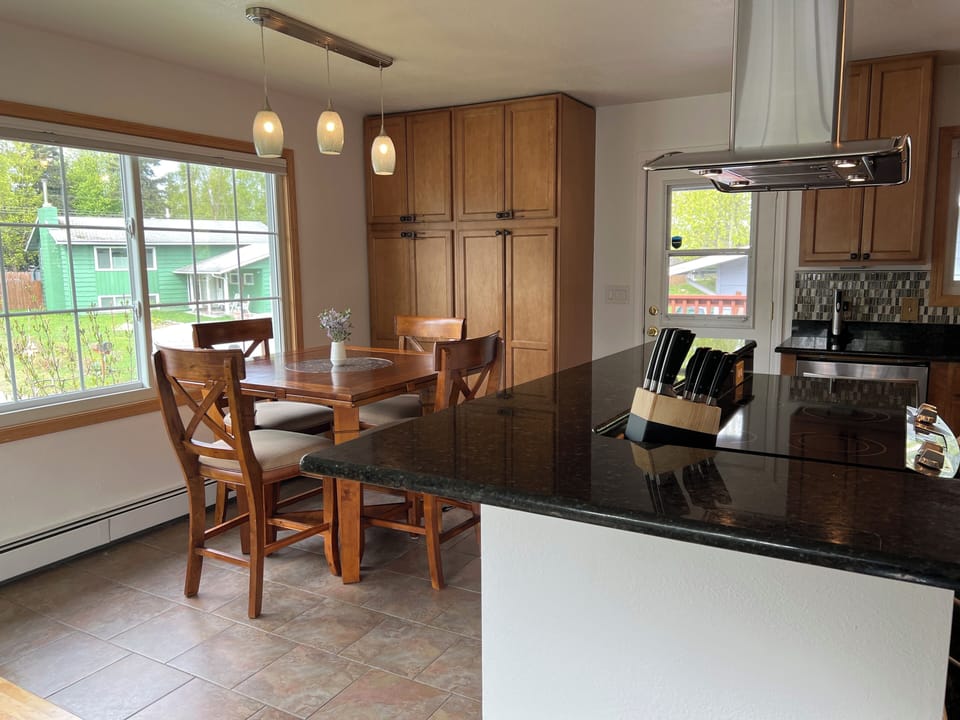 Dining area seats 6 with table opened up