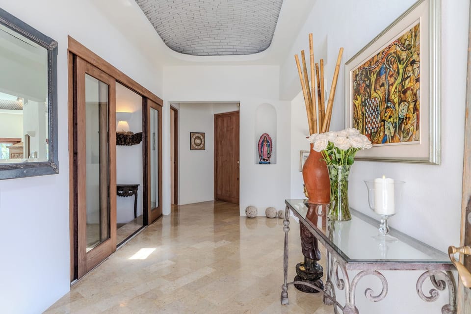 Entry with Marble Flooring and Domed Ceilings